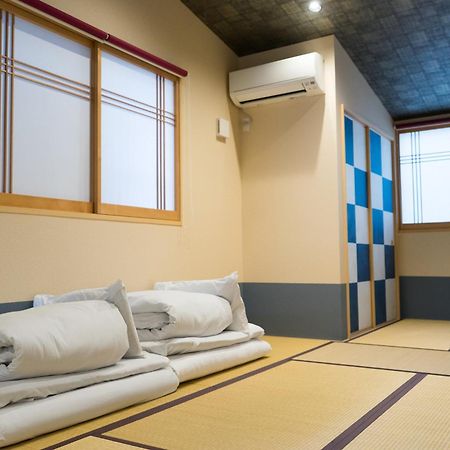 Guesthouse Zennichi เกียวโต ภายนอก รูปภาพ